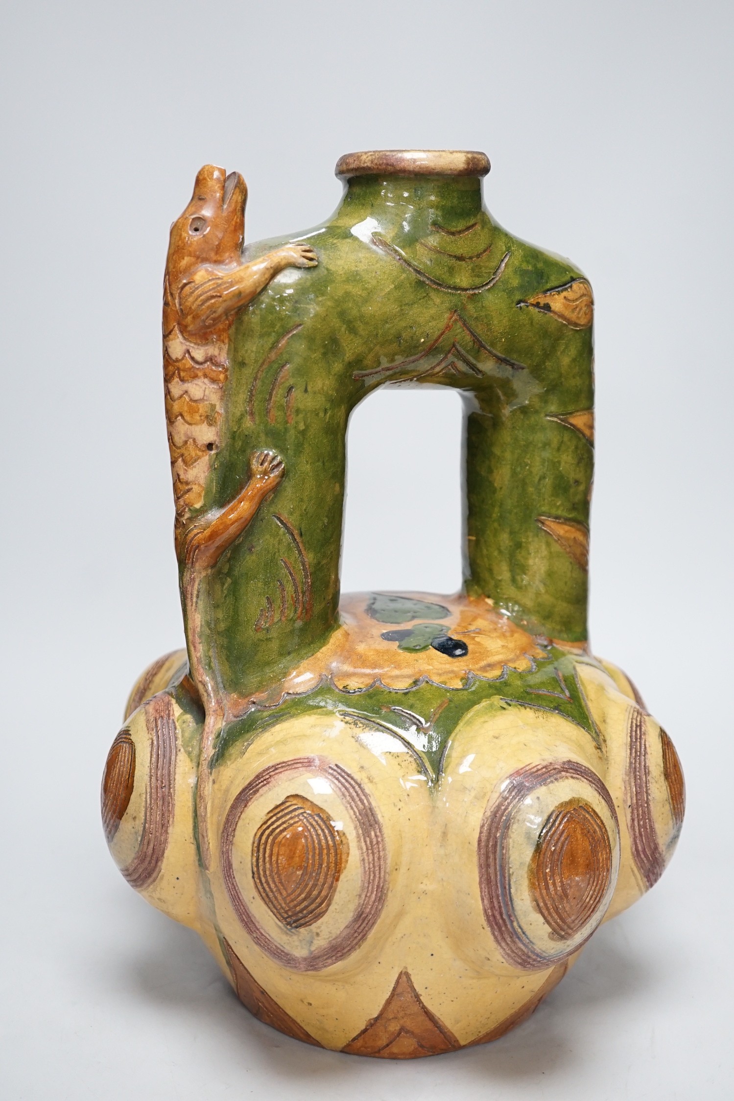 A Continental ‘lizard’ mounted pottery vase, 40cm